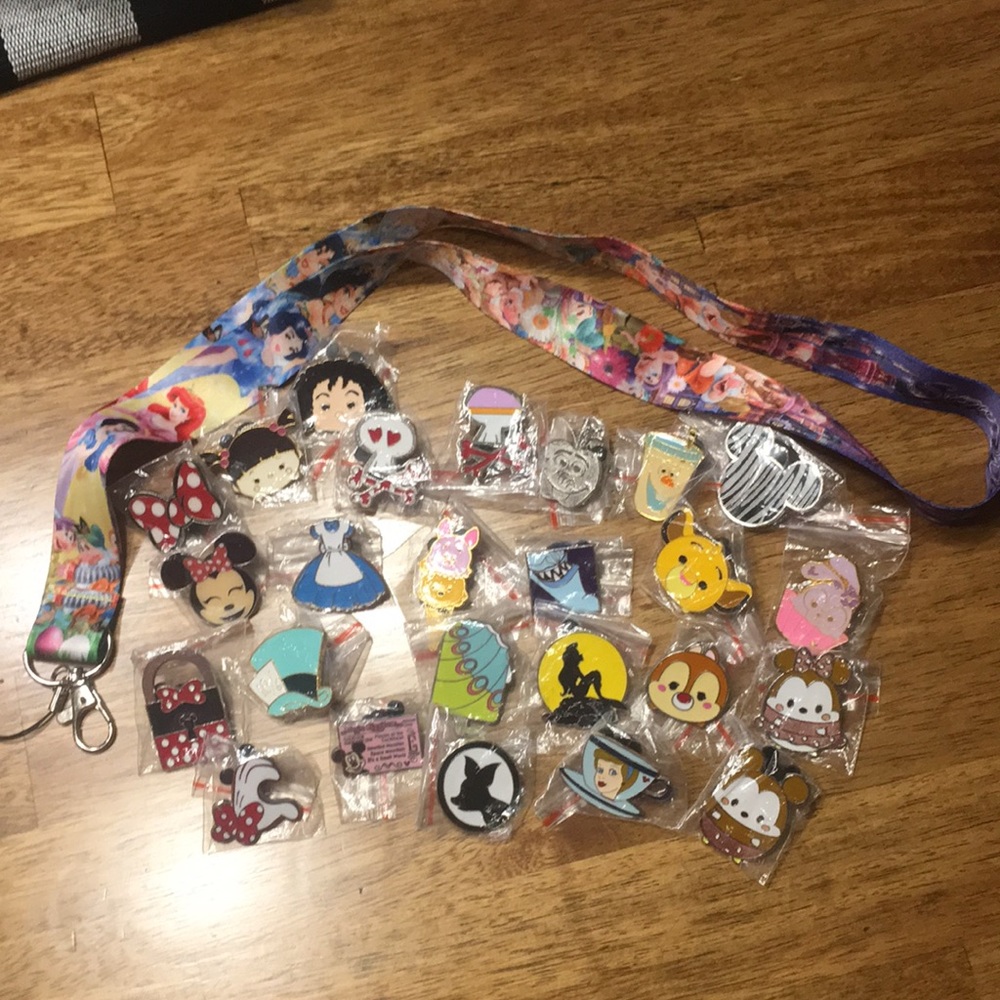 Disney pin set of 25 plus lanyard
